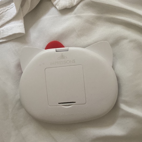 Hello Kitty Mirror. Brand: Impressions, Color: Red and white, Size: No size - Picture 2 of 4